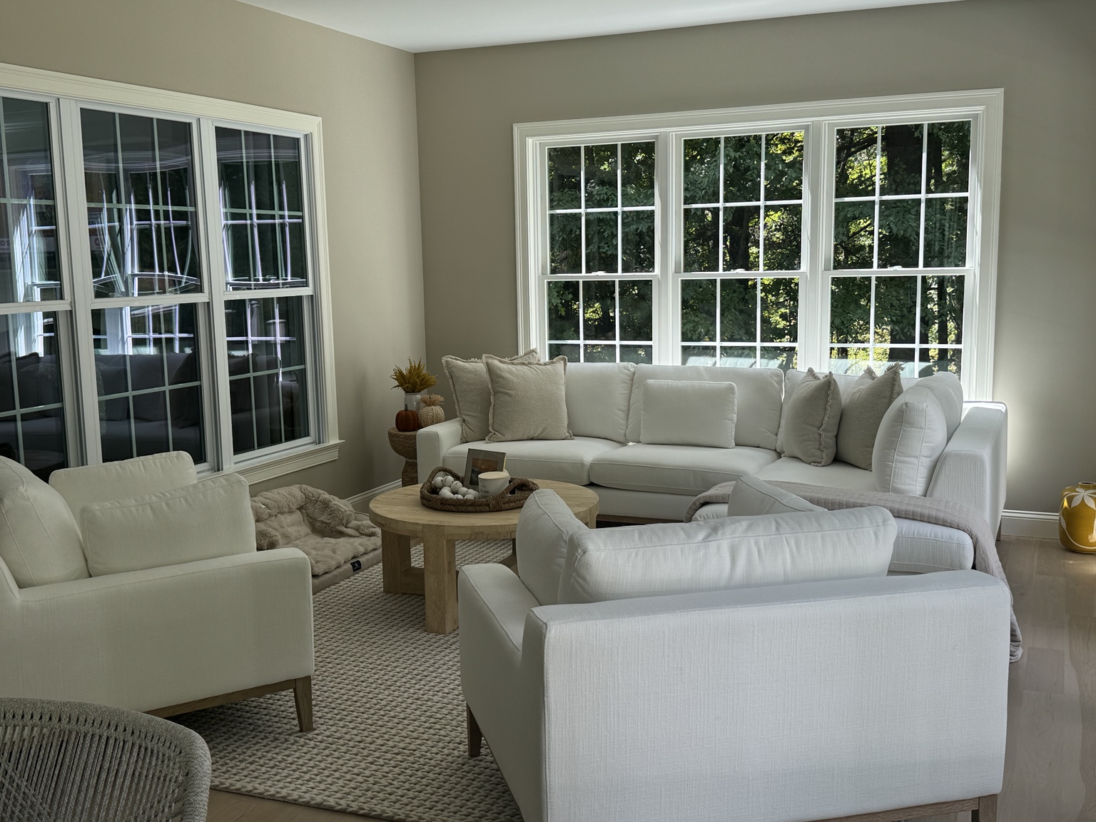 Calm, layered living and dining space designed by BW Design